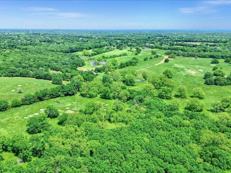 1747 Desvoignes Road Denison, TX 75021 - Photo 10 of 40 an aerial view of a house with a yard