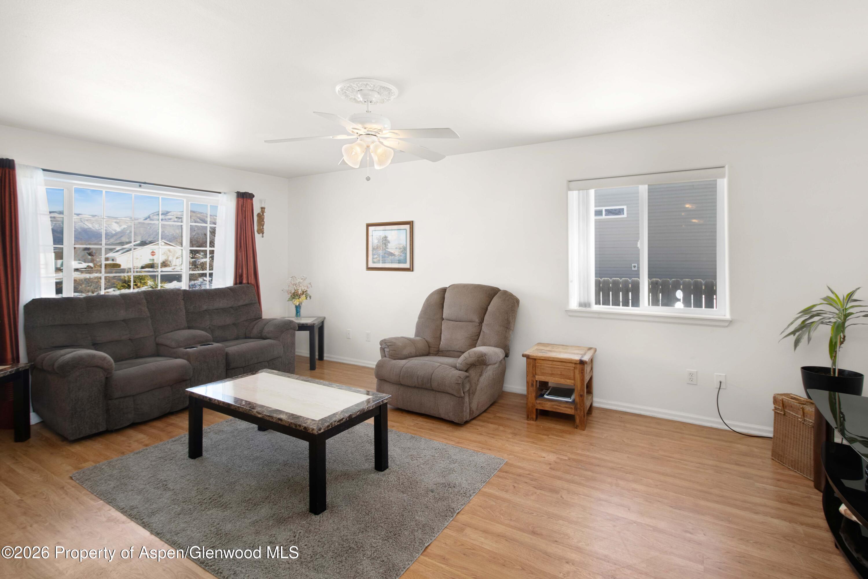 256 Cliff View Circle Parachute, CO 81635 - Photo 2 of 20 a living room with furniture and a window