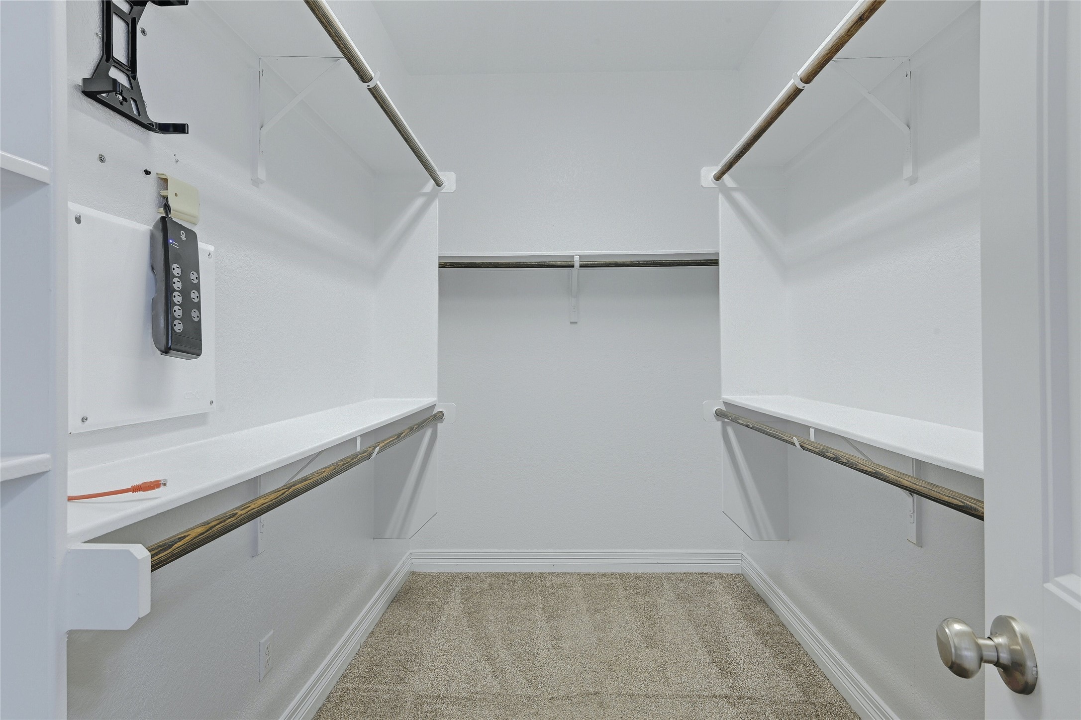 18512 Tanner Bayou Loop Austin, TX 78738 - Photo 13 of 32 a view of an empty walk in closet