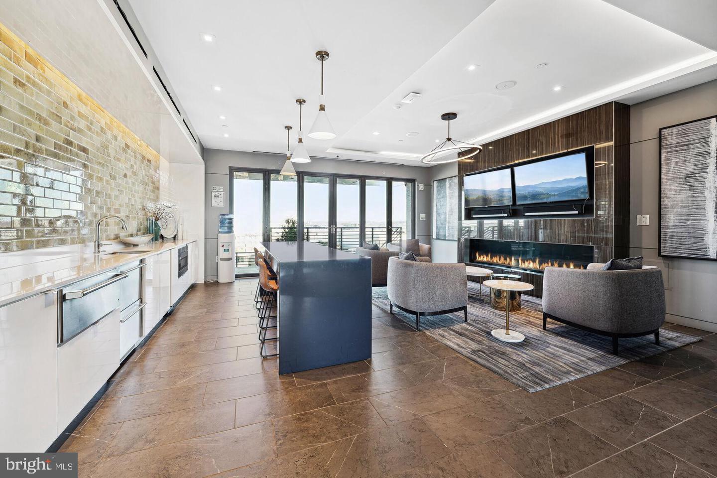 1211 Van Street Southeast, Unit 1010 Washington, DC 20003 - Photo 12 of 19 a living room with furniture a large window and stainless steel appliances