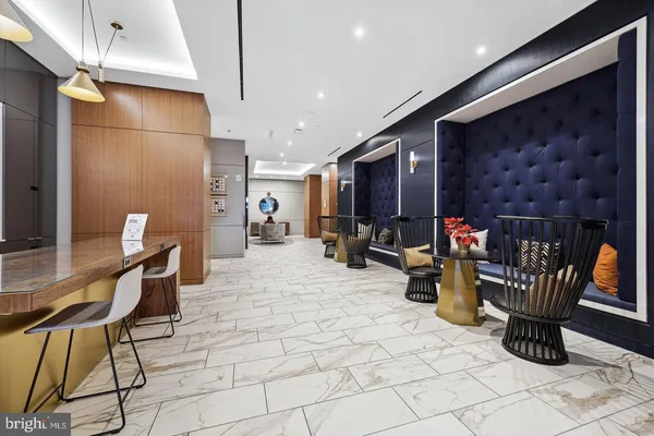 a view of a chairs and table in a room