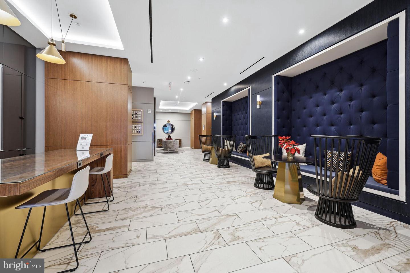 1211 Van Street Southeast, Unit 1010 Washington, DC 20003 - Photo 8 of 19 a view of a chairs and table in a room