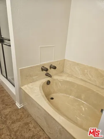 a bathroom with a bathtub