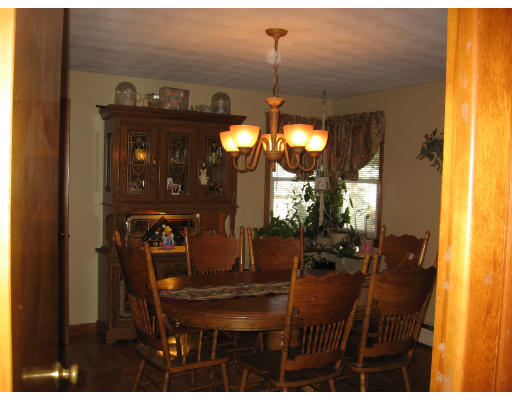 15 Harper Street Springfield, MA 01108 - Photo 6 of 7 a view of a dining room with furniture and window