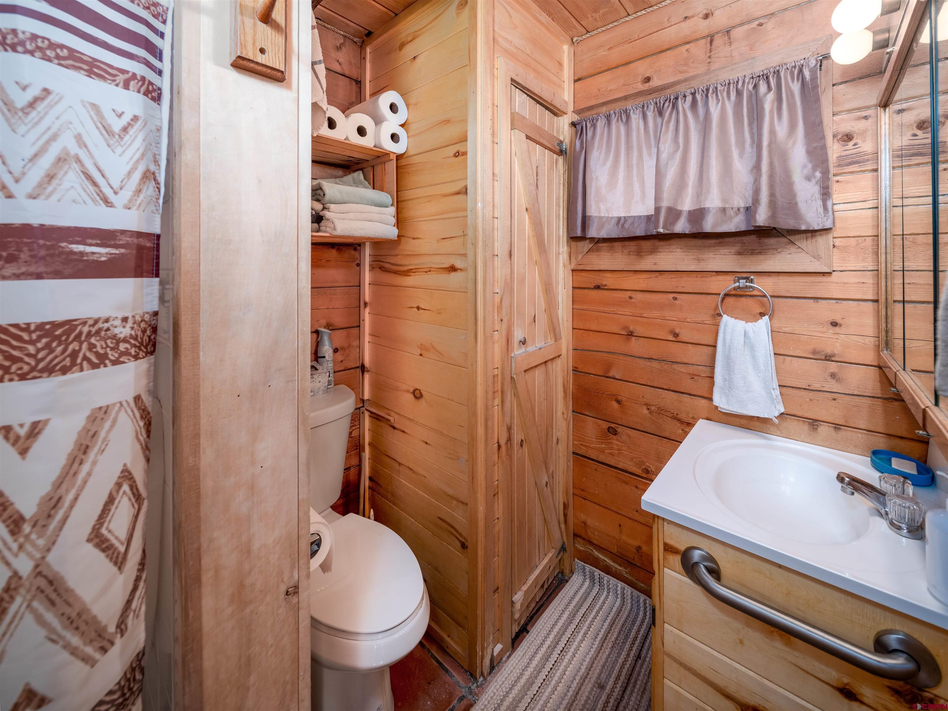 25901 Rd T Dolores, CO 81323 - Photo 20 of 45 a bathroom with a sink and toilet