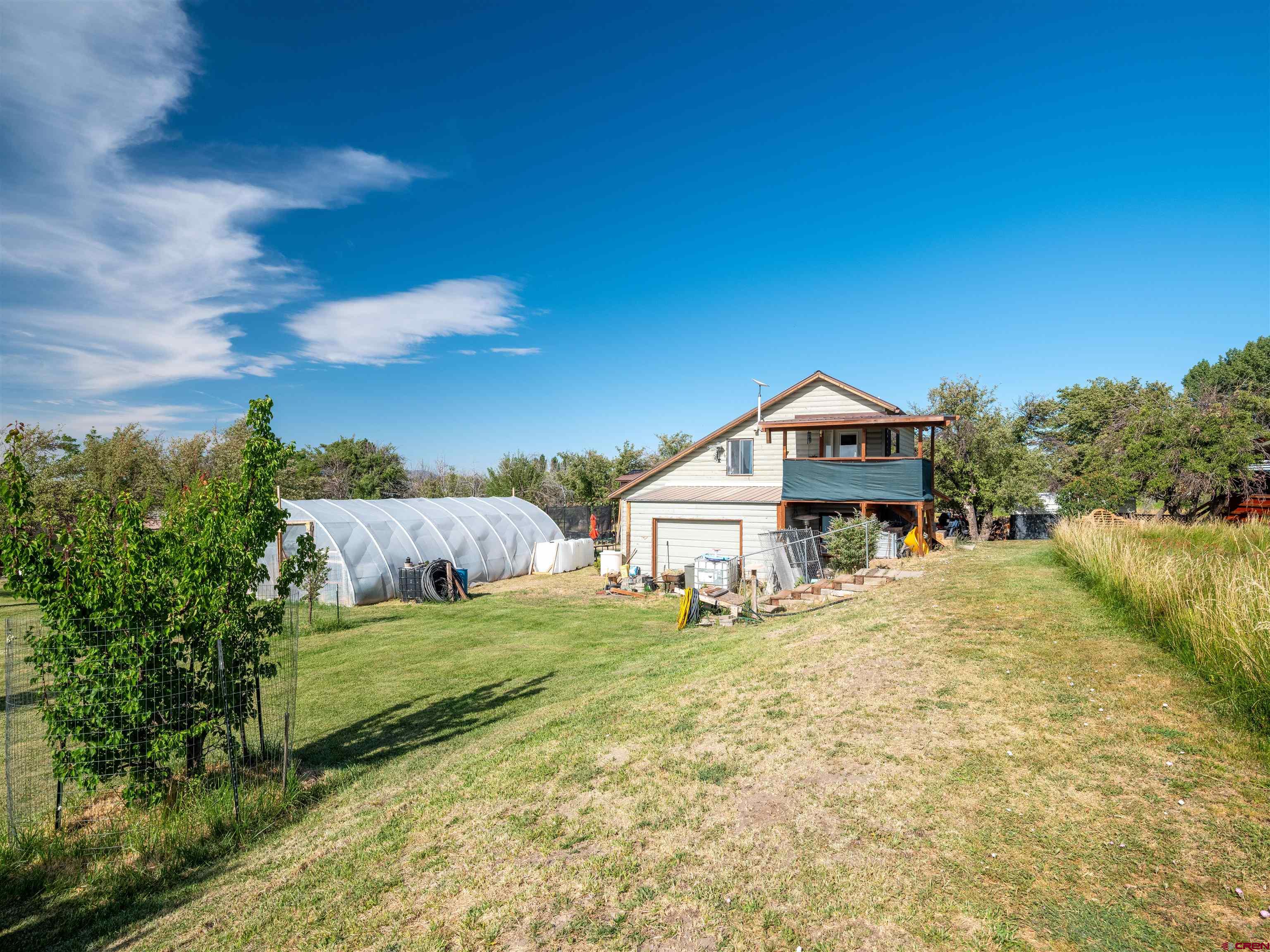 25901 Rd T Dolores, CO 81323 - Photo 23 of 45 a view of a house with a yard