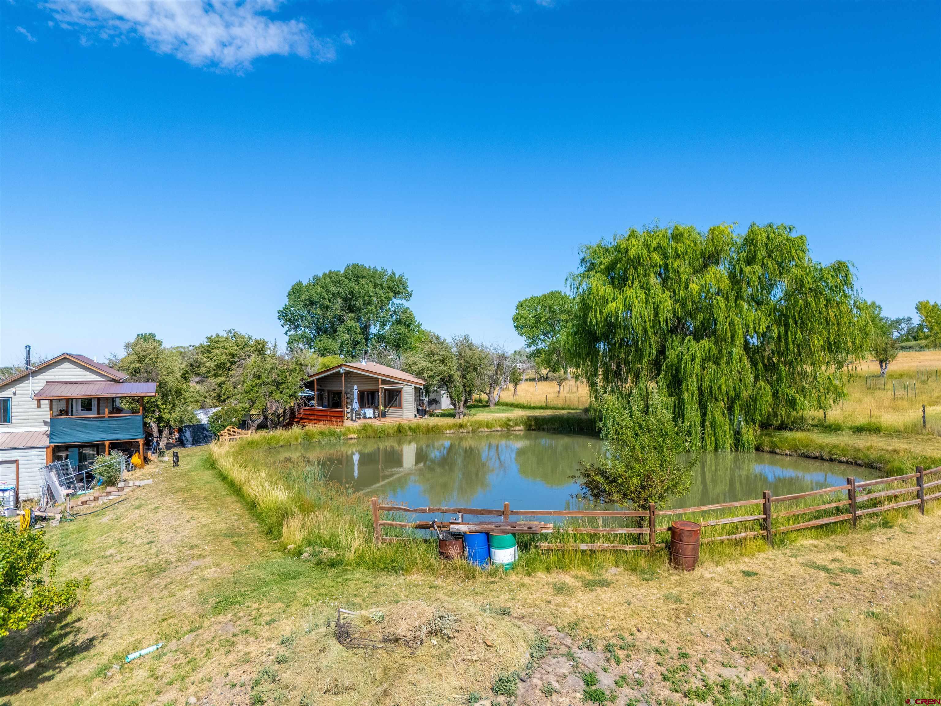 25901 Rd T Dolores, CO 81323 - Photo 9 of 45 a view of a swimming pool with a yard
