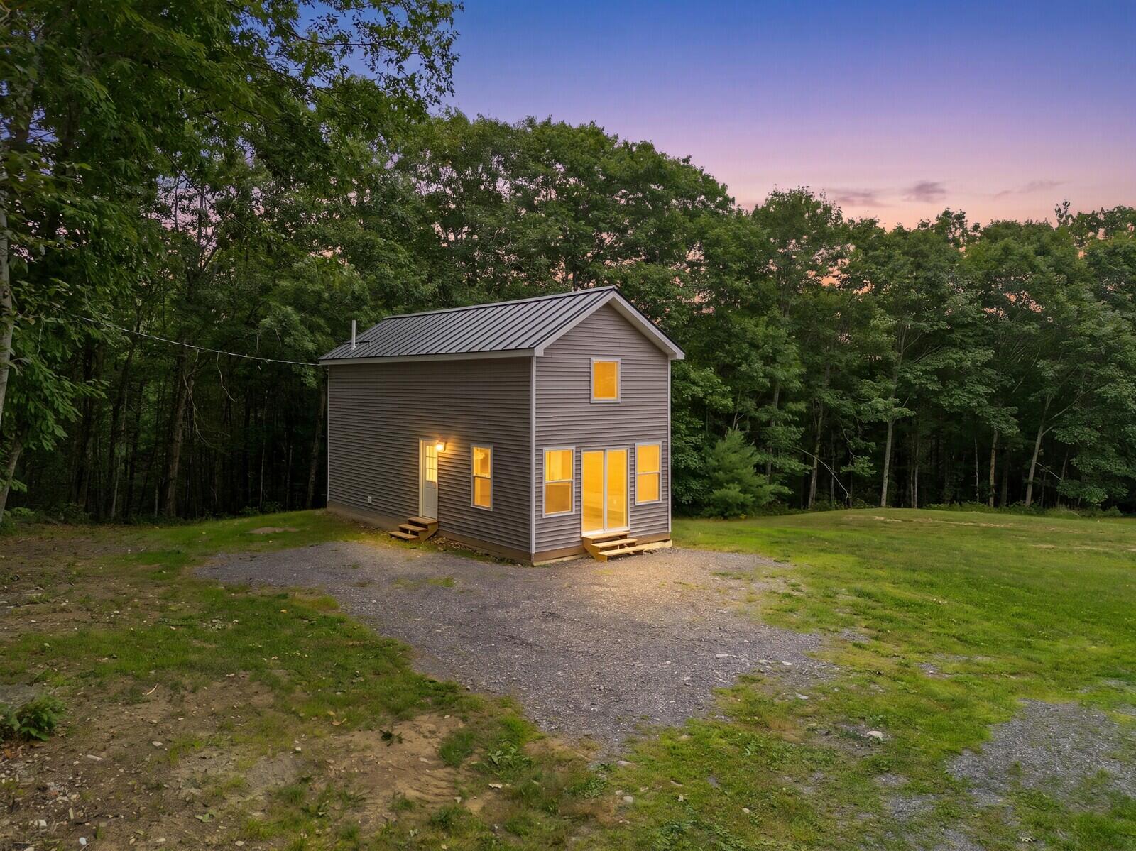 212 Ross Hill Road St. Albans, ME 04971 - Photo 1 of 31 02_DJI_0116_DxO_twilight_3f1c9237_mls