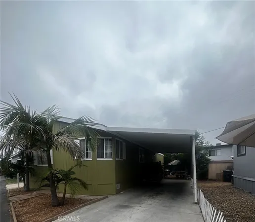 a view of backyard with sitting area