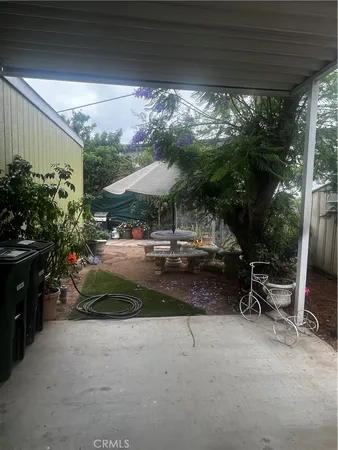 a view of outdoor space with porch and outdoor seating