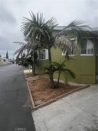 a view of a backyard with a patio