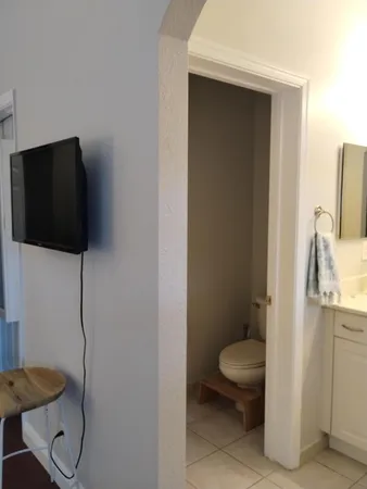 a bathroom with a sink and mirror