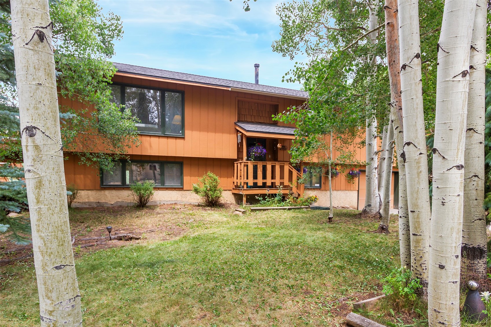 857 Deer Path Road Dillon, CO 80435 - Photo 2 of 29 a view of a house with backyard porch and sitting area