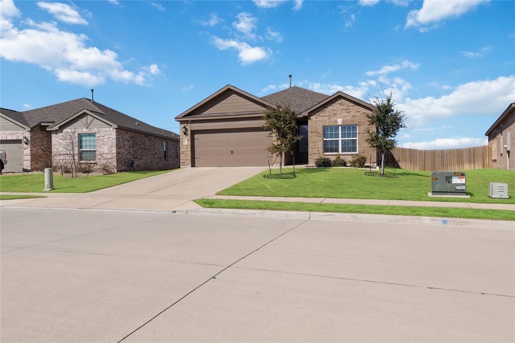 1012 Calhoun Drive Anna, TX 75409 - Photo 2 of 39 Single-story residence featuring a brick and siding exterior