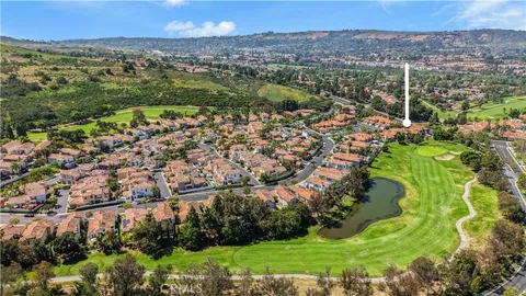 an aerial view of residential house and outdoor space