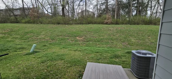 a view of outdoor space and yard