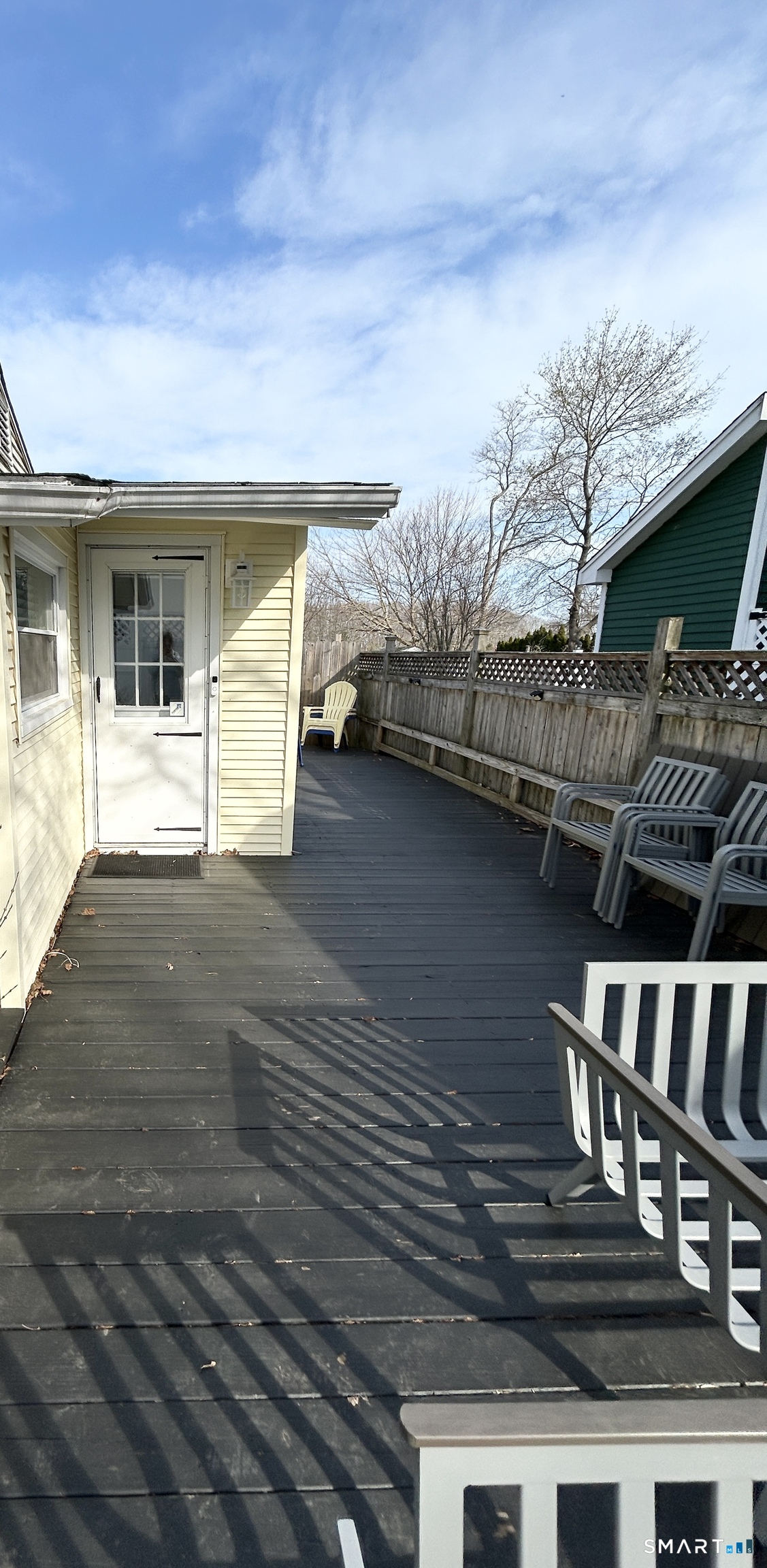 7 3rd Street, Unit 7 Madison, CT 06443 - Photo 42 of 44 a view of house with roof deck