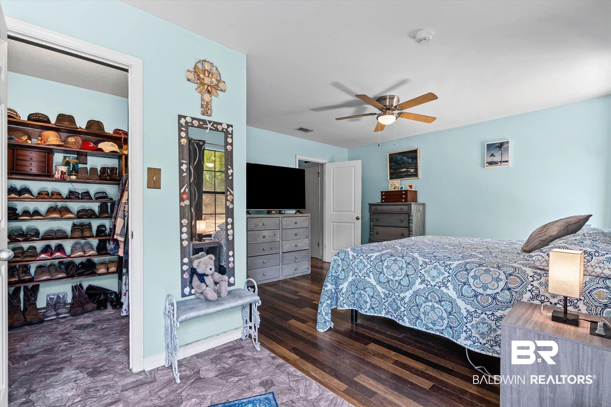 3846 Leslie Road Saraland, AL 36571 - Photo 15 of 40 Bedroom with a ceiling fan and dark wood-style flooring