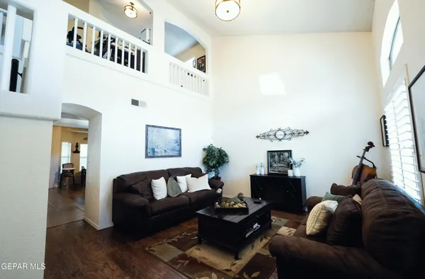 a living room with furniture and a window