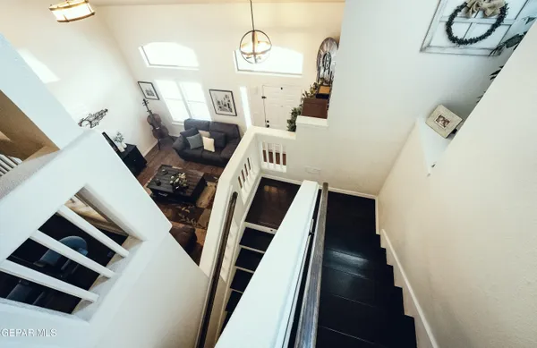 a view of an entryway with wooden floor
