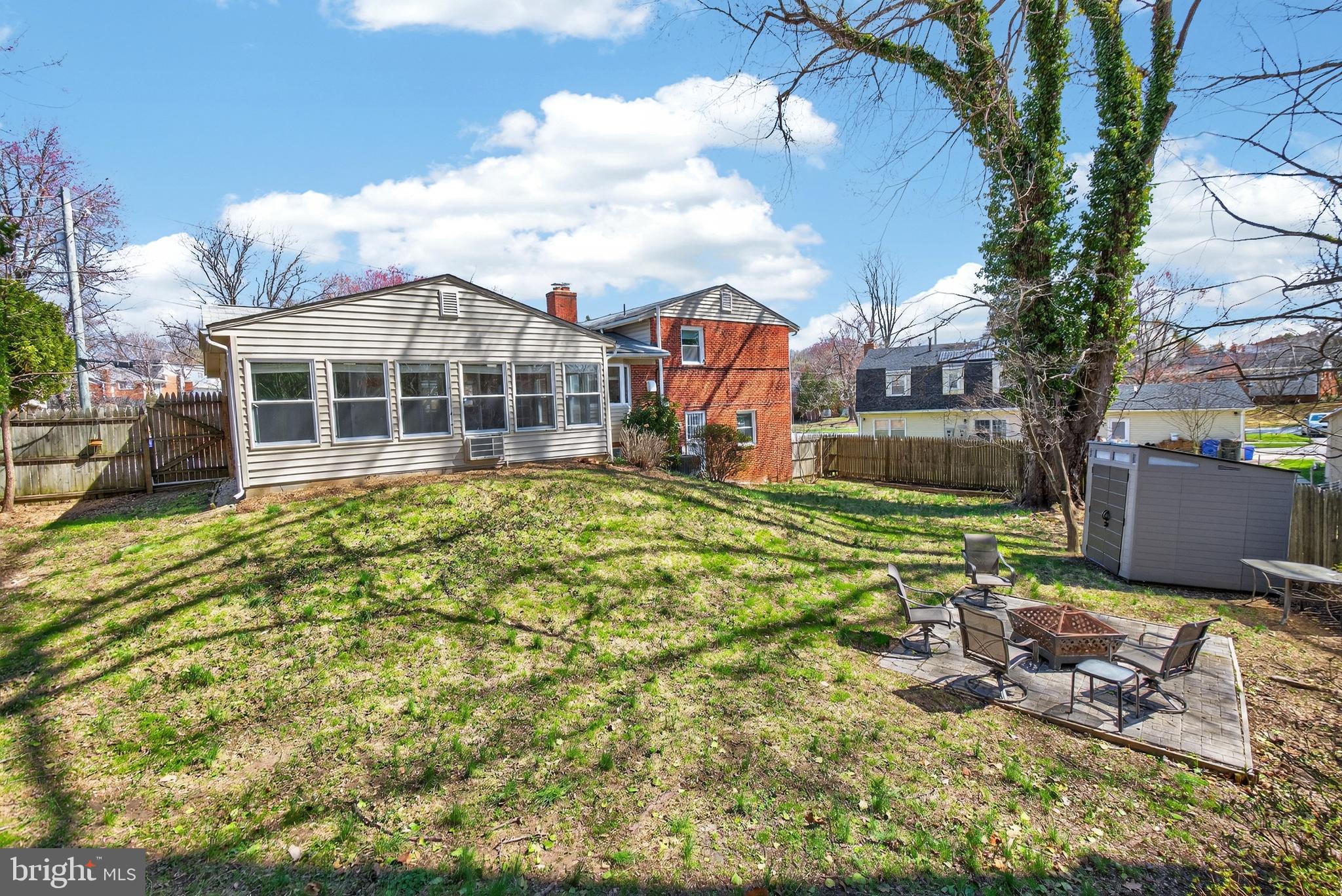 11004 Oakwood Street Silver Spring, MD 20901 - Photo 33 of 35 a view of a house with a yard and sitting area
