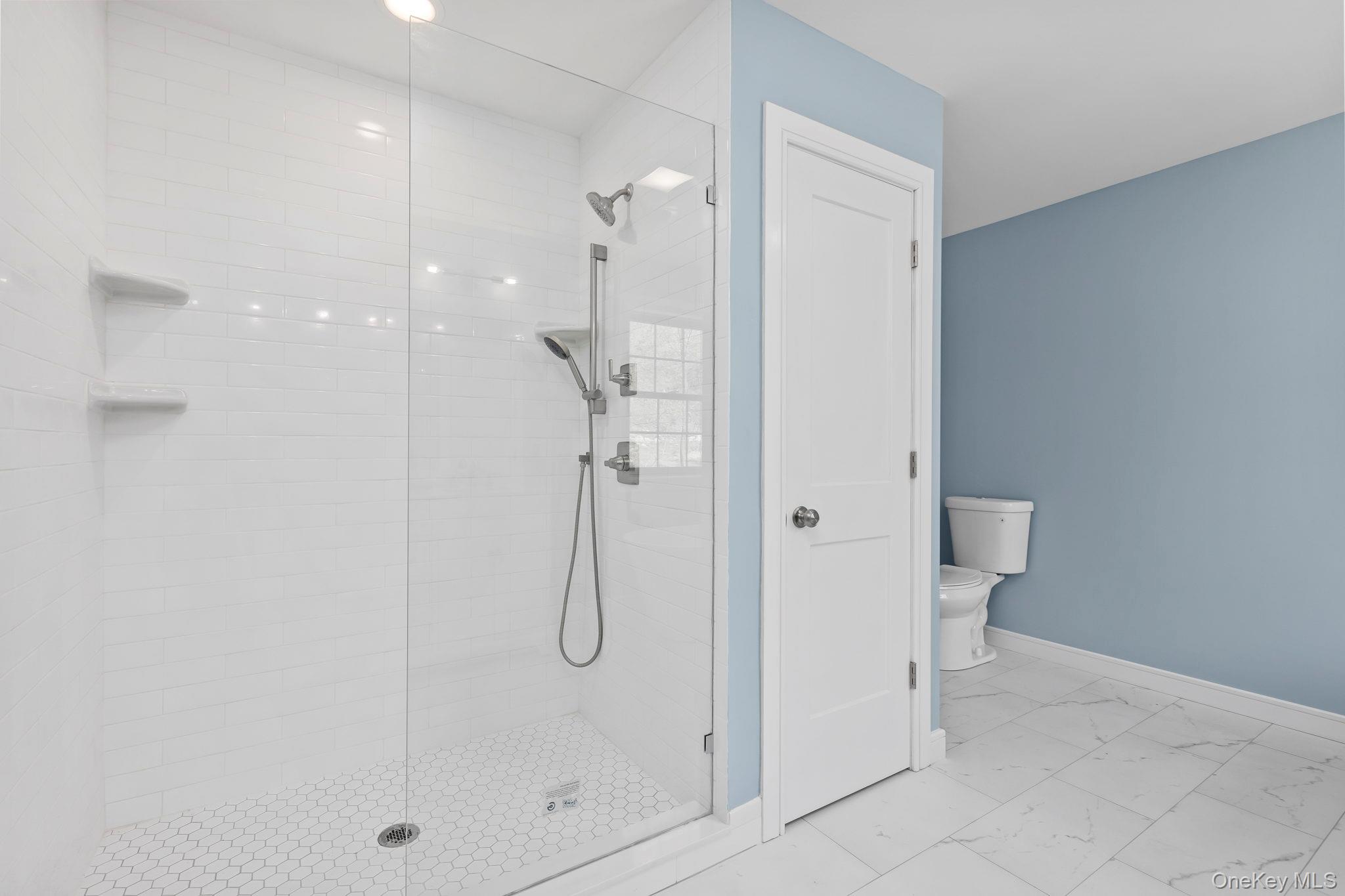 194 South Road Holmes, NY 12531 - Photo 14 of 19 Photo depicts bathroom completed for sister house. Large separate glass enclosed shower with similar finishes to be completed. Finishes can vary from this photo. Set allowance will be given by seller