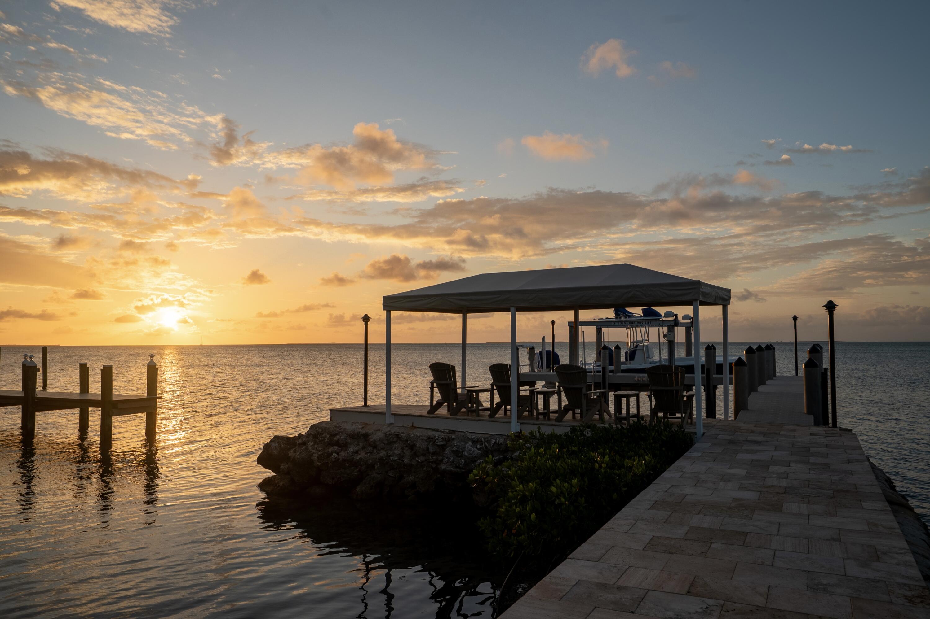 134 North Rolling Hill Road Tavernier, FL 33070 - Photo 57 of 65 a view of a lake with outdoor seating