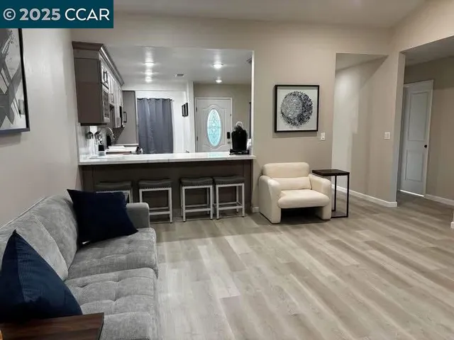 a bathroom with a sink mirror vanity and toilet
