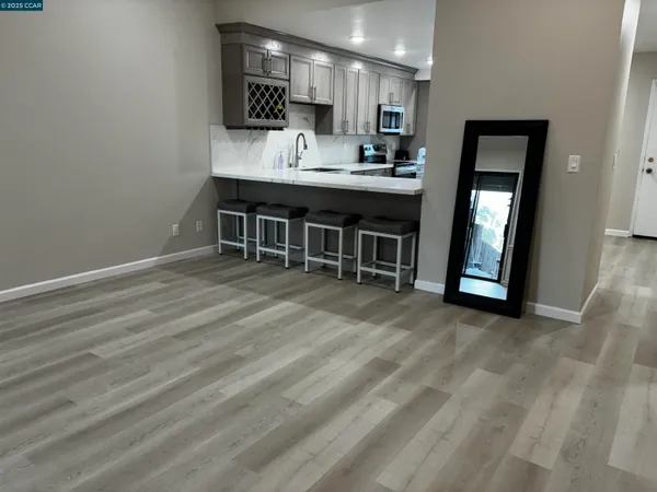 a view of a kitchen with a sink