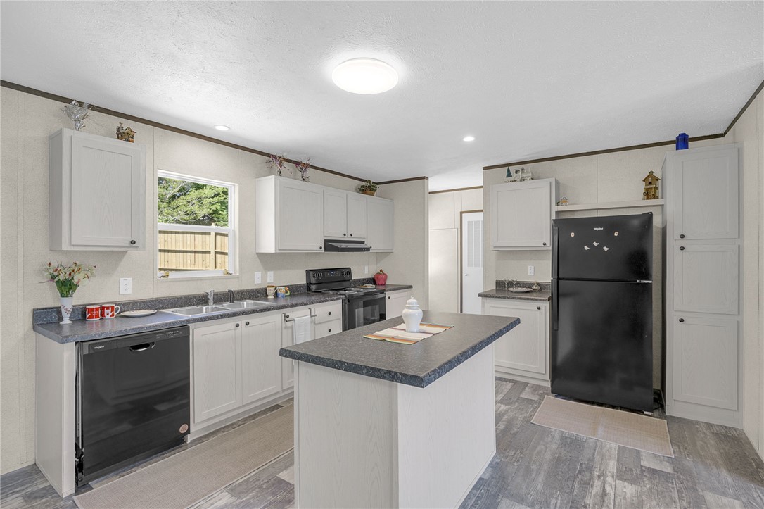 375 Griggs Road Six Mile, SC 29682 - Photo 10 of 36 This bright kitchen features a functional layout, perfect for casual meals and entertaining.