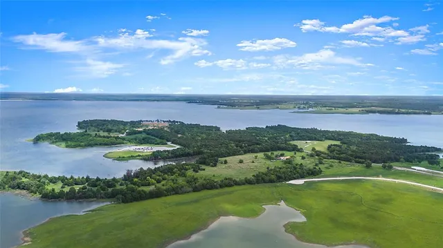 a view of a lake with a city