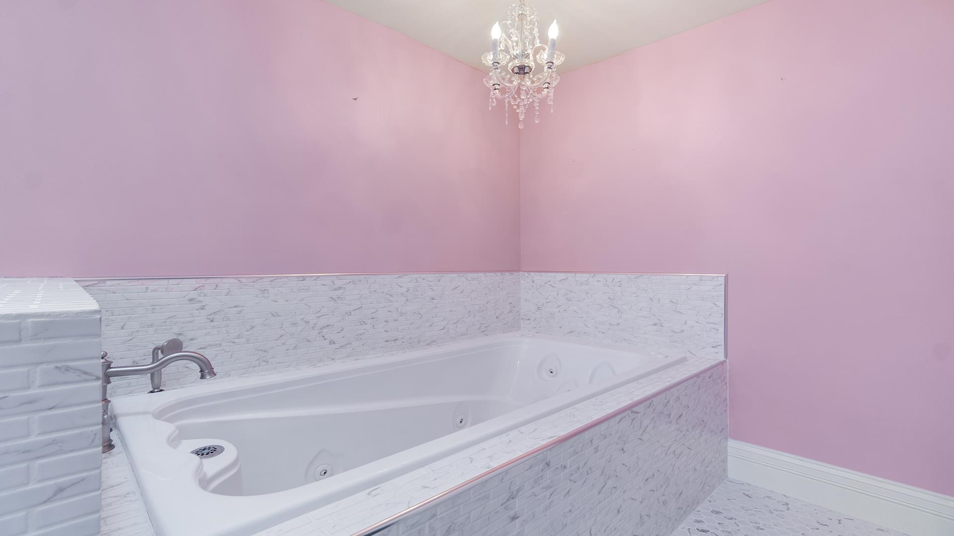 3927 Mill Road Cherry Valley, IL 61016 - Photo 22 of 36 a bathroom with a bathtub