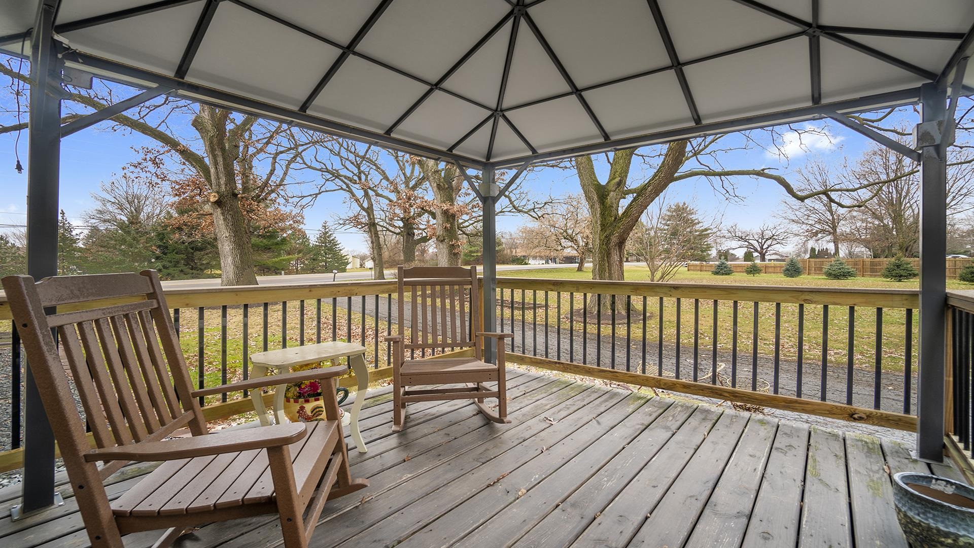 3927 Mill Road Cherry Valley, IL 61016 - Photo 32 of 36 a view of porch with a bench