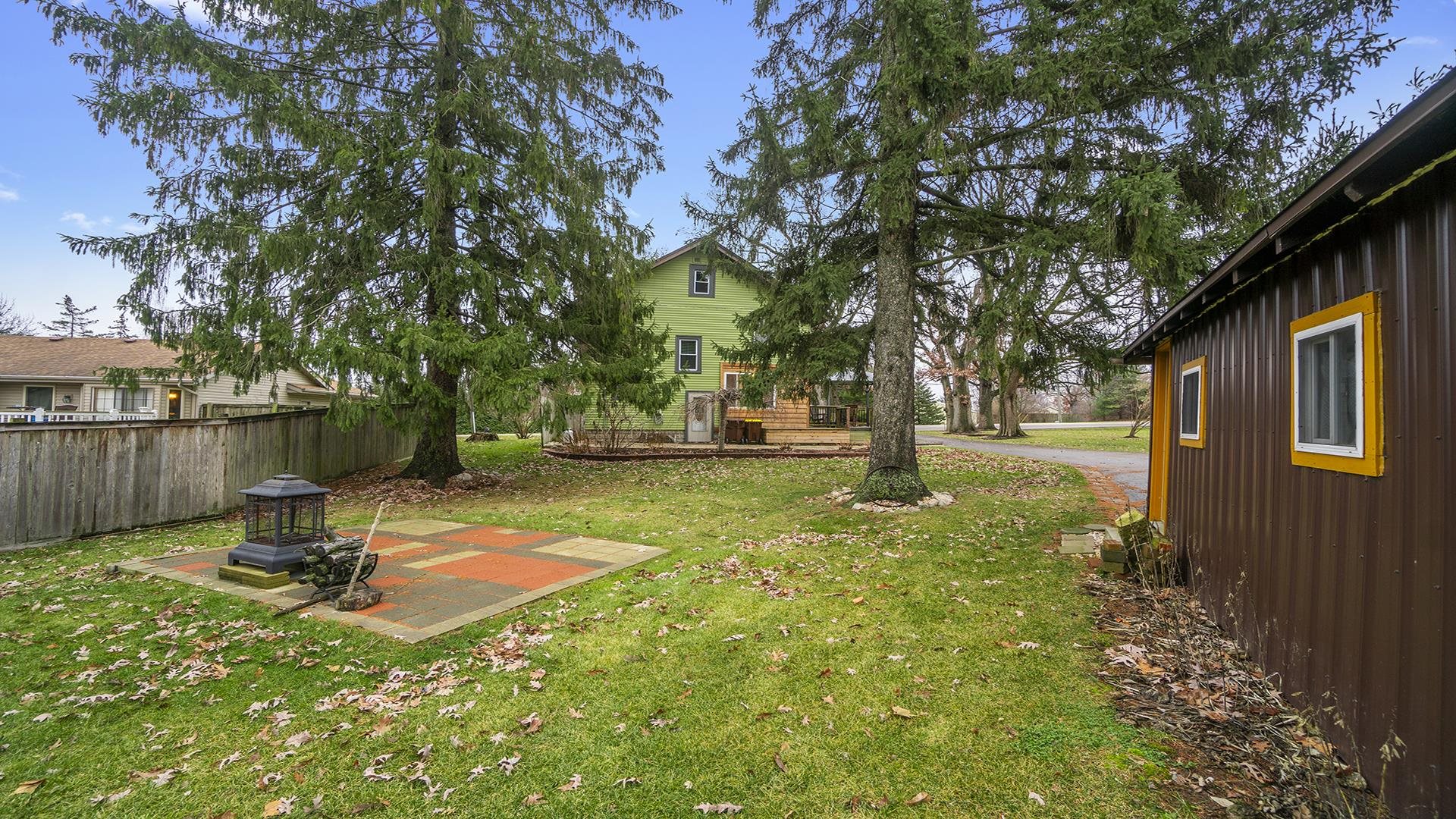 3927 Mill Road Cherry Valley, IL 61016 - Photo 34 of 36 a view of a park with swings