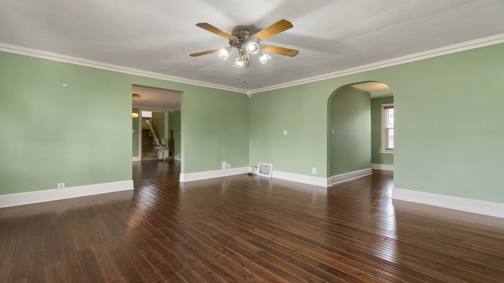 3927 Mill Road Cherry Valley, IL 61016 - Photo 6 of 36 a view of an empty room with wooden floor