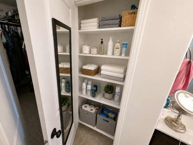 1687 South Windemere Road Santaquin, UT 84655 - Photo 13 of 27 Built-in storage shelving with multiple white shelves and integrated organization