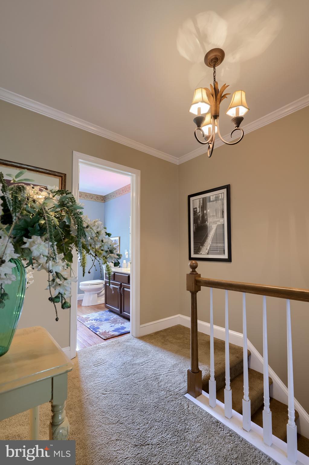 15 Sunrise Drive Lititz, PA 17543 - Photo 19 of 35 a view of a livingroom with furniture wooden floor and a chandelier