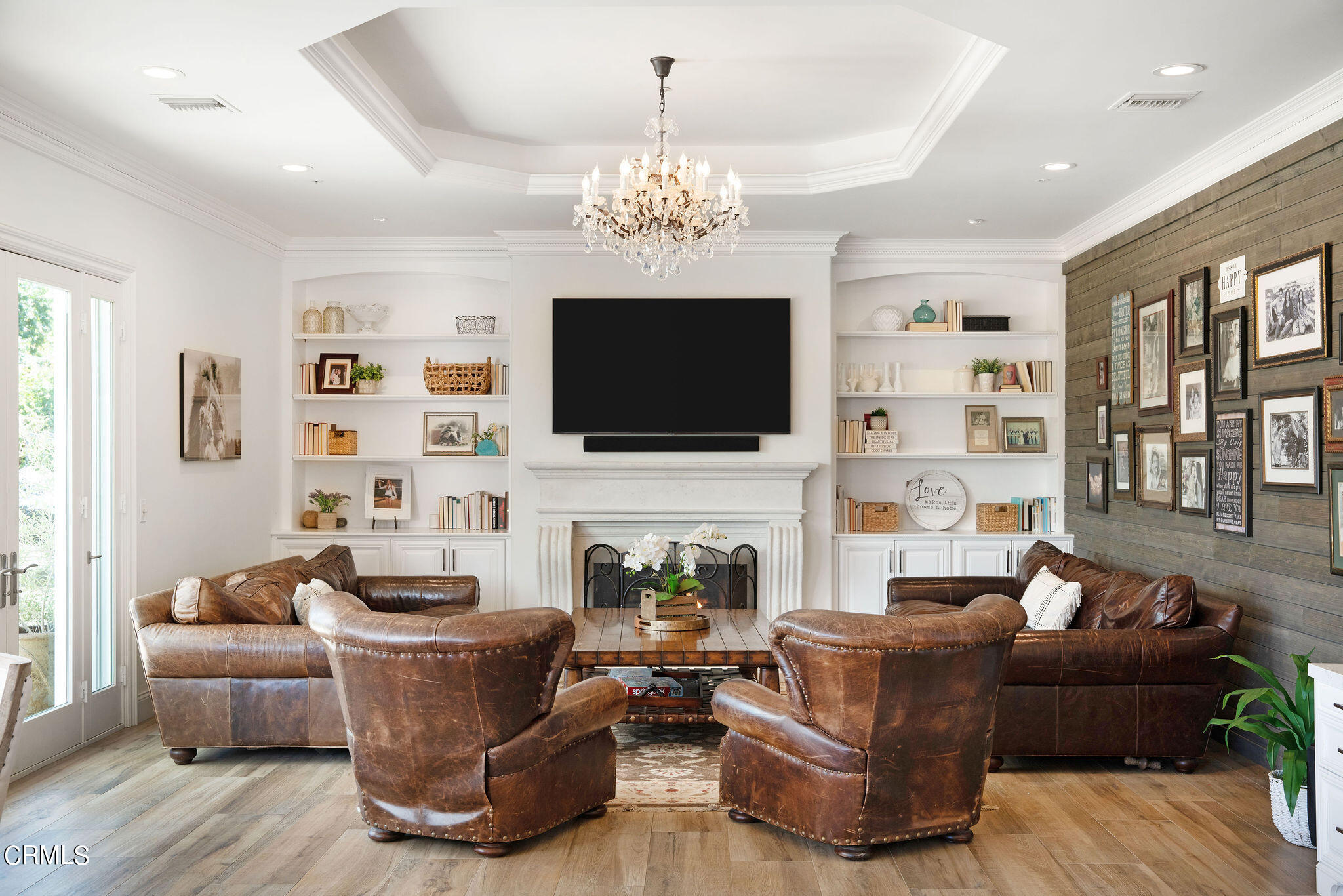2050 Freeborn Way Camarillo, CA 93012 - Photo 16 of 61 a living room with fireplace furniture and a flat screen tv