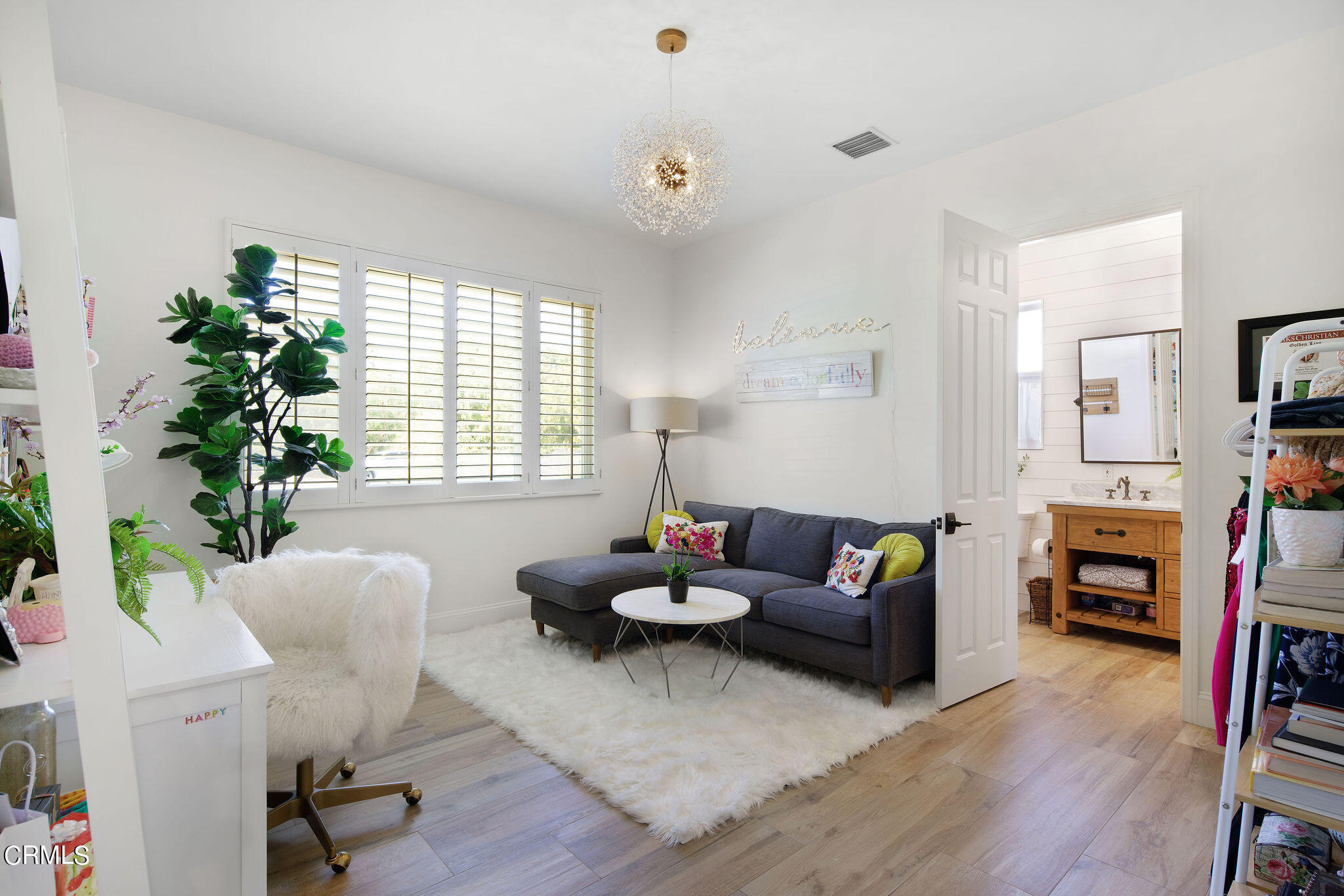 2050 Freeborn Way Camarillo, CA 93012 - Photo 26 of 61 a living room with furniture and a potted plant