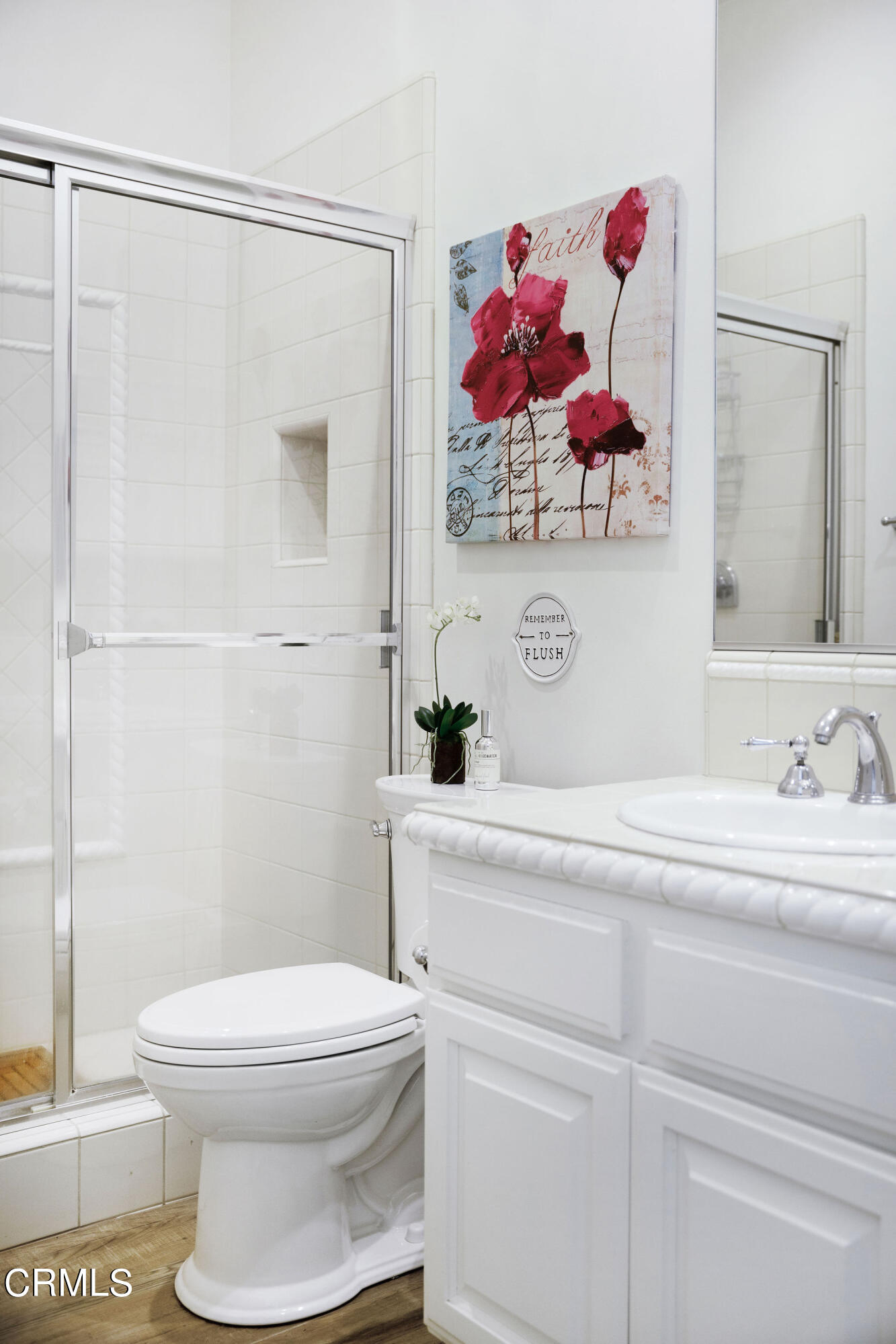 2050 Freeborn Way Camarillo, CA 93012 - Photo 34 of 61 a bathroom with a sink a toilet and a mirror