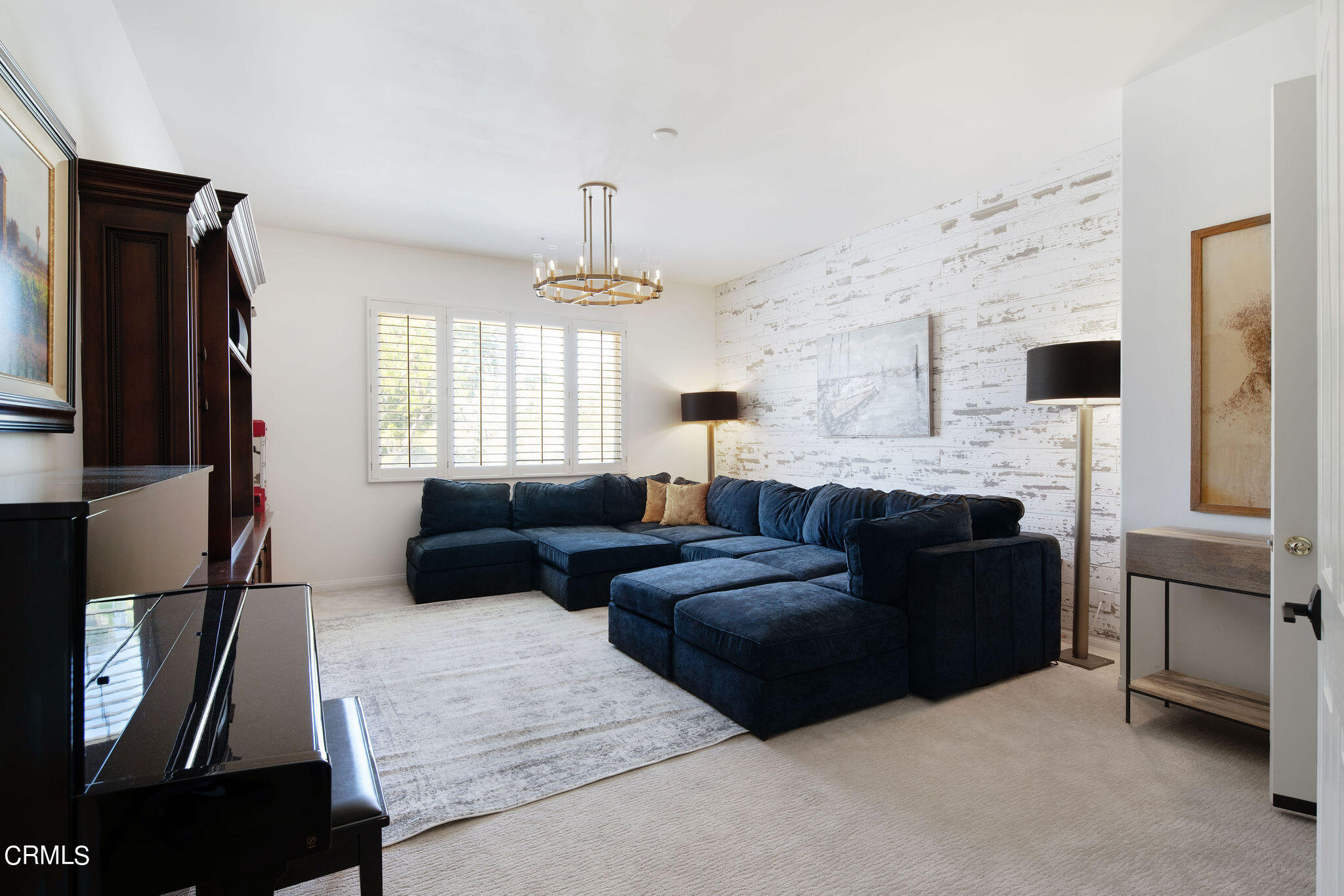 2050 Freeborn Way Camarillo, CA 93012 - Photo 35 of 61 a living room with furniture a fireplace and a flat screen tv