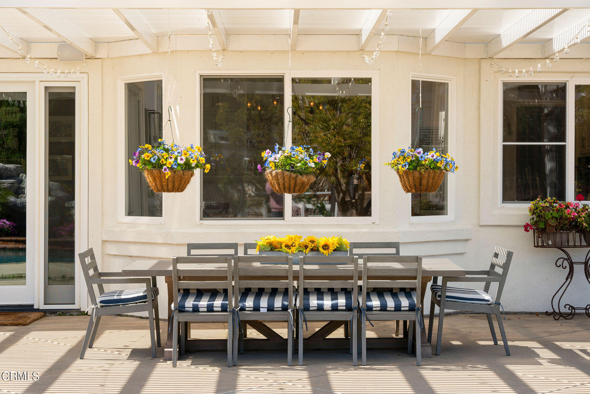 2050 Freeborn Way Camarillo, CA 93012 - Photo 43 of 61 a view of a dinning tables and chairs in a patio area