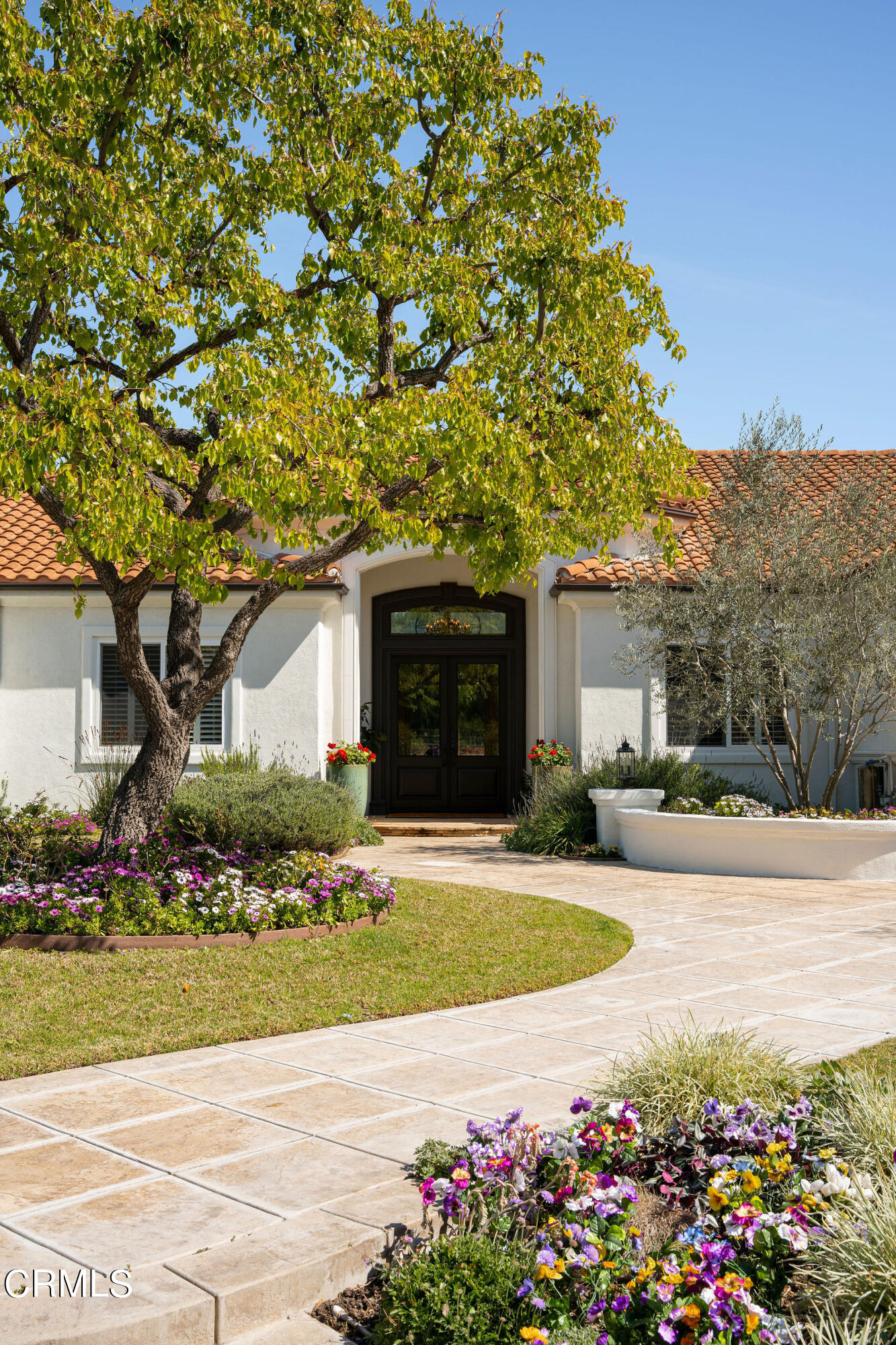 2050 Freeborn Way Camarillo, CA 93012 - Photo 54 of 61 a front view of a house with a yard and garage