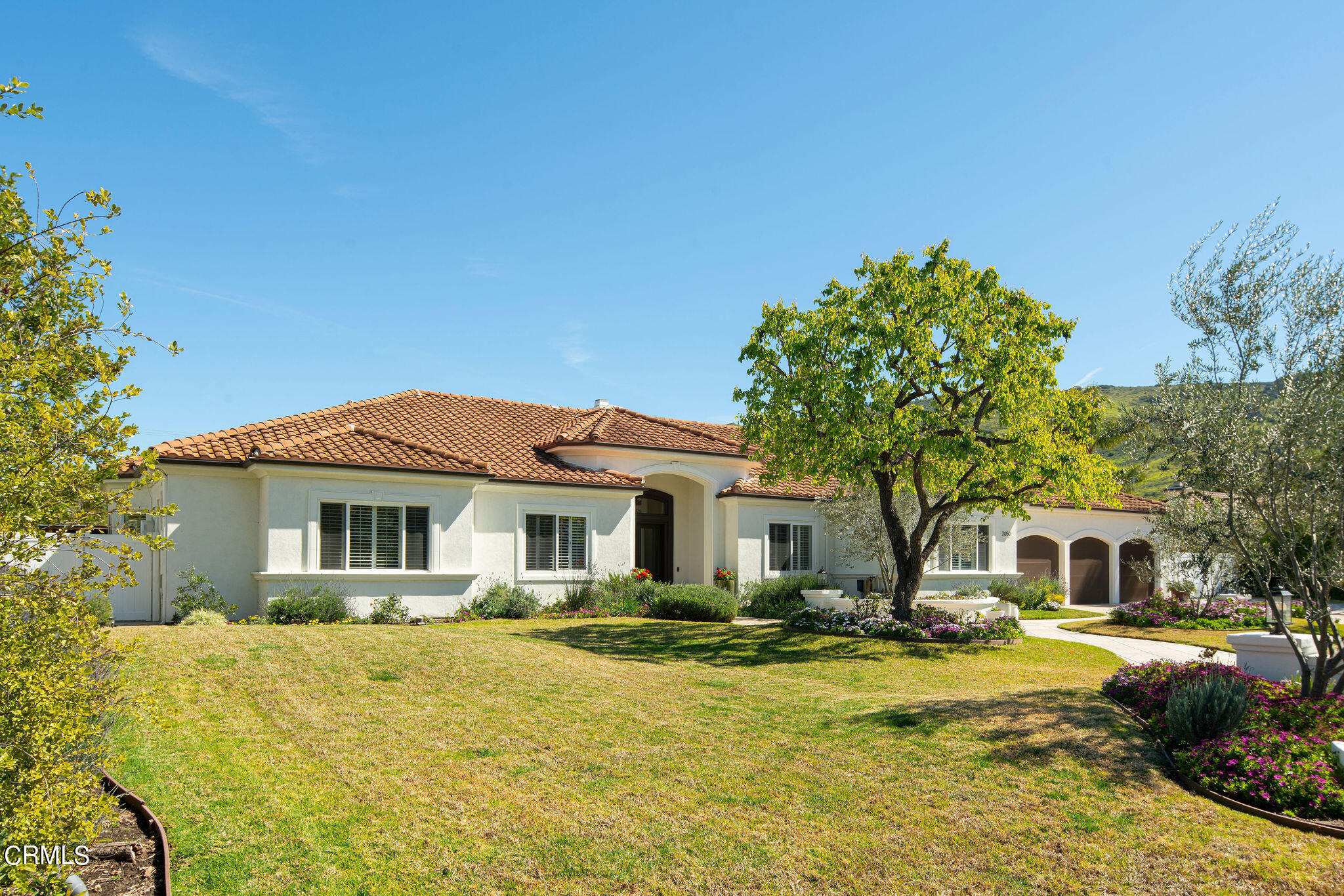 2050 Freeborn Way Camarillo, CA 93012 - Photo 58 of 61 a front view of a house with a yard