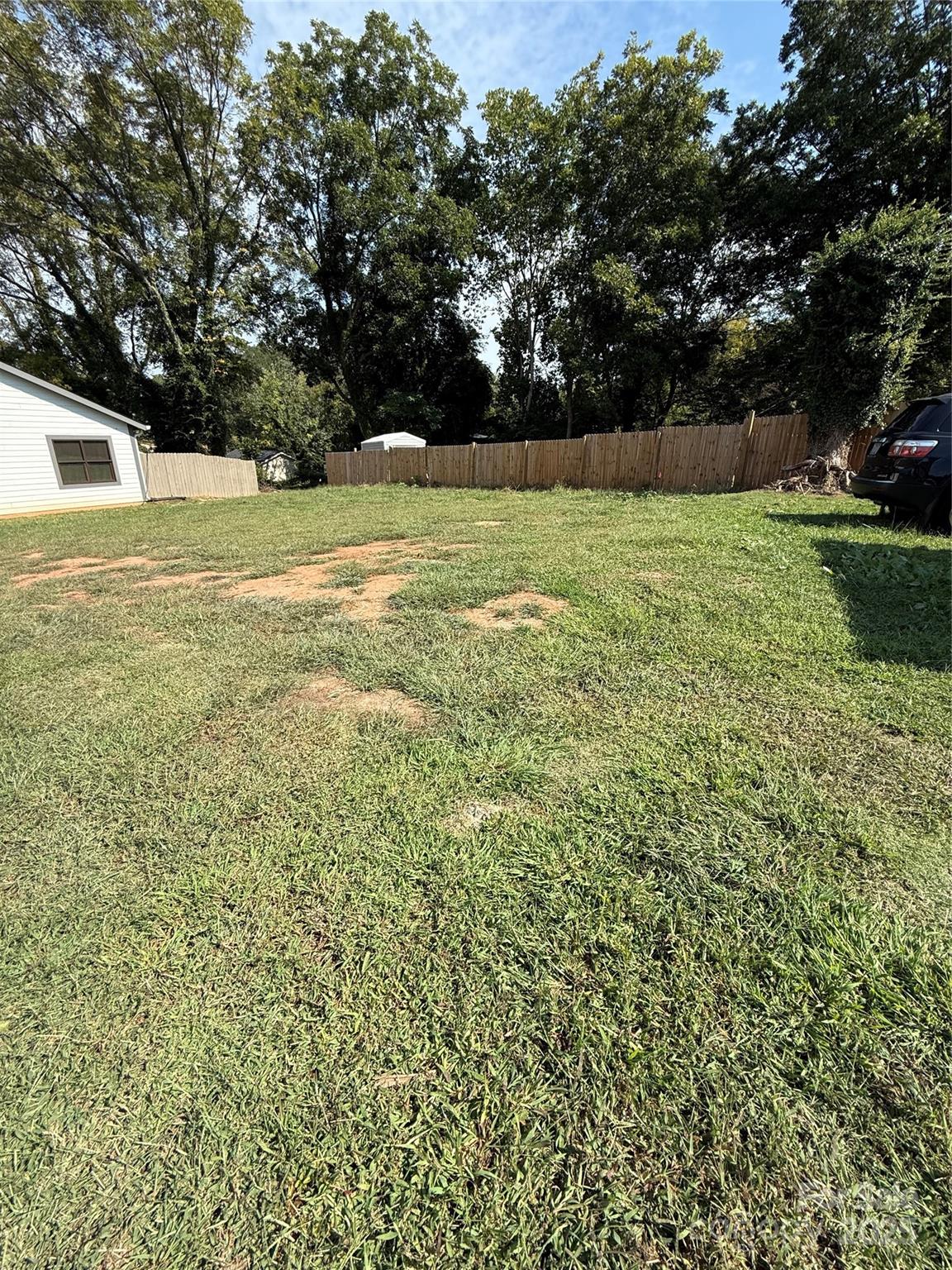 907 3rd St Court Southwest Hickory, NC 28602 - Photo 9 of 17 a view of a field with an trees