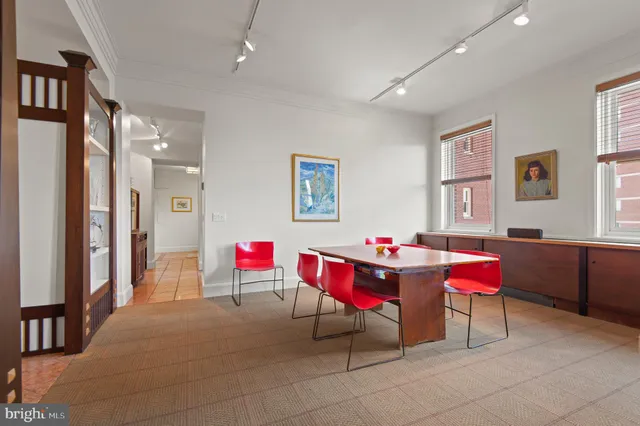 a living room with furniture and rug