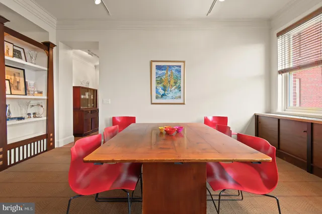 a kitchen with stainless steel appliances granite countertop a stove and cabinets