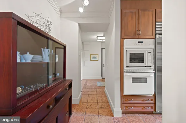 a view of a hallway with workspace
