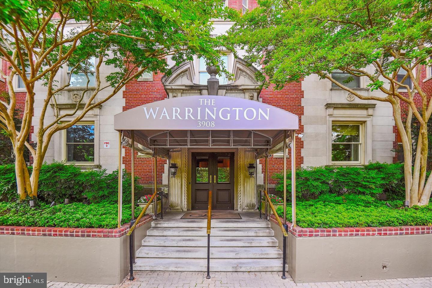 3908 North Charles Street, Unit 501 Baltimore, MD 21218 - Photo 3 of 54 a front view of a building with garden
