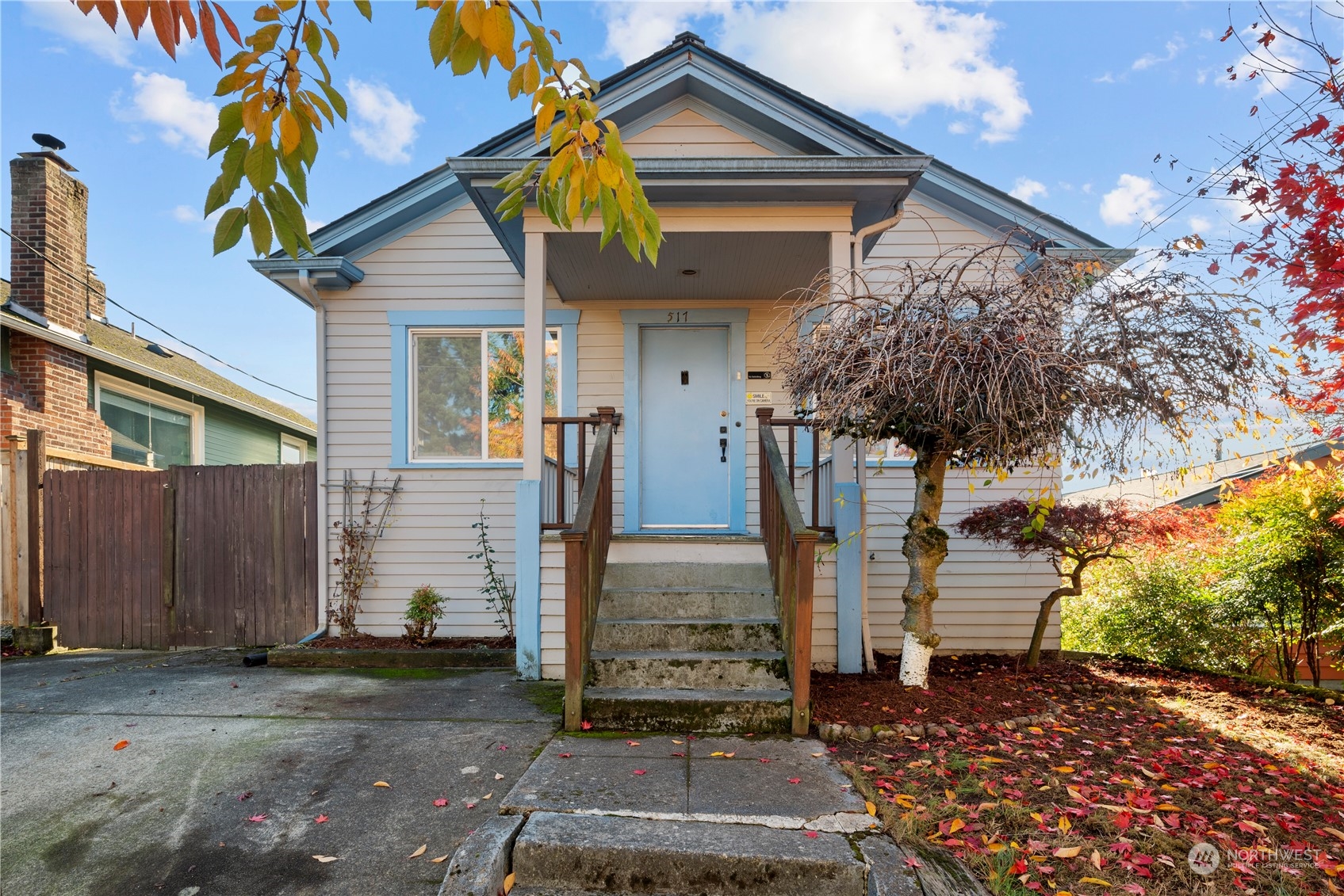 517 North 84th Street Seattle, WA 98103 - Photo 1 of 29 a front view of a house with garden